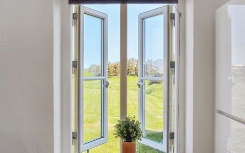 Sira - 250M from the Sea: Glass, Daylighting, Home Door, Molding, Design, Hardwood, Houseplant, Balcony, Aluminium, Window Treatment