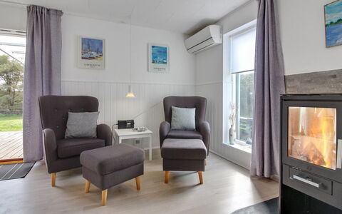 Hellin - 300M from the Sea: Furniture, Flooring, Interior Design, Floor, Wood, Living Room, Room, Couch, Television, Ceiling