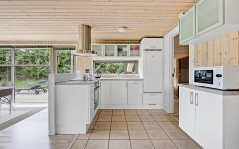 Into - 400M from the Sea: Kitchen, Countertop, Kitchen Appliance, Flooring, Interior Design, Wood, Ceiling, Major Appliance, Floor, Cabinetry