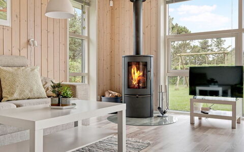 Into - 400M from the Sea: Flooring, Wood Flooring, Furniture, Floor, Hardwood, Laminate Flooring, Living Room, Wood-Burning Stove, Wood Stain, Houseplant