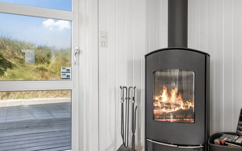 Ingemar - 100M from the Sea: Hearth, Wood-Burning Stove, Wood Flooring, Living Room, Fireplace, Lamp
