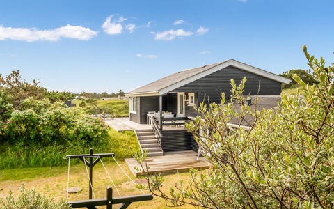 Stina - 250M from the Sea: Roof, Home, Door, Cottage, Shade, Siding, Yard, Estate, Backyard