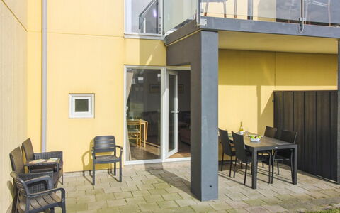 Kauko - 150M from the Sea: Flooring, Floor, Door, Chair, Shade, Wood Stain, Glass, Houseplant, Balcony, Flowerpot