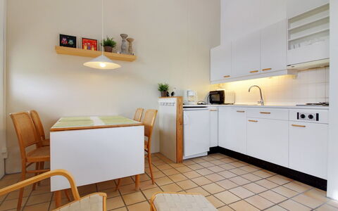 Tomte - 70M from the Sea: Interior Design, Flooring, Kitchen, Floor, Wood, Furniture, Ceiling, Kitchen Appliance, Major Appliance, Countertop