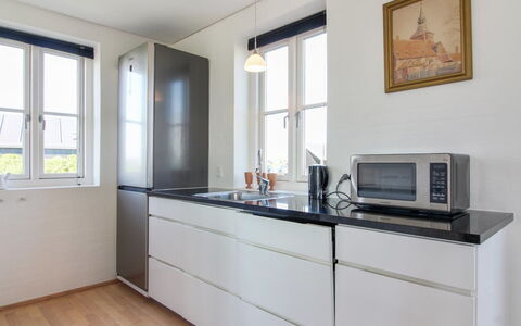 Adrian - 200M from the Sea: Kitchen, Countertop, Cabinetry, Flooring, Kitchen Appliance, Wood, Interior Design, Floor, Major Appliance, Home Appliance