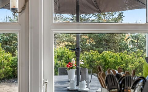Mathy - 900M from the Sea: Furniture, Chair, Flowerpot, Kitchen & Dining Room Table, Outdoor Furniture, Glass, Houseplant, Outdoor Table, Shade, Patio
