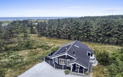 Jens - 425M from the Sea: Roof, Home, Door, Cottage, Shade, Siding, Yard, Estate, Backyard