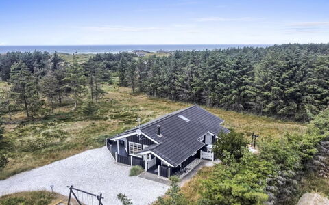 Jens - 425M from the Sea: Roof, Home, Door, Cottage, Shade, Siding, Yard, Estate, Backyard