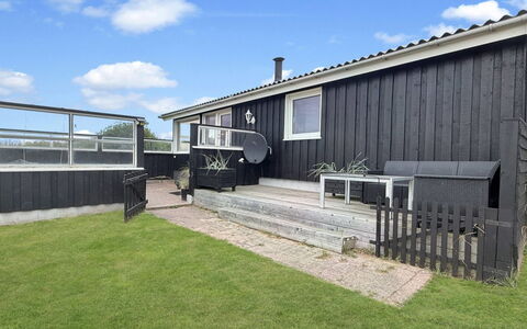 Steffenie - 400M from the Sea: Siding, Roof, Home, Backyard, Cottage, Lawn, Yard, Garden, Shade, Fence