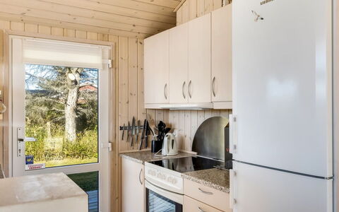 Söhnke - 400M from the Sea: Kitchen, Wood, Major Appliance, Kitchen Appliance, Interior Design, Flooring, Countertop, Furniture, Home, Floor
