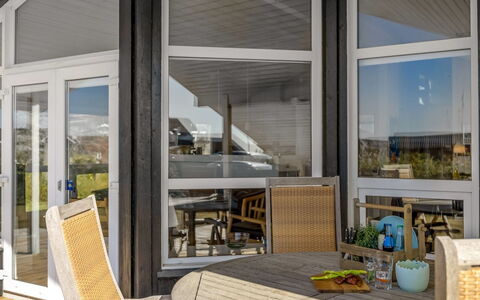 Söhnke - 400M from the Sea: Wood, Furniture, Interior Design, Chair, Glass, Shade, Outdoor Furniture, Porch, Hardwood, Wood Stain