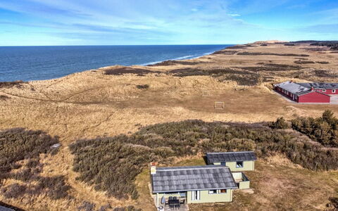 Cathalin - 100M from the Sea: Roof, Home, Door, Cottage, Shade, Siding, Yard, Estate, Backyard