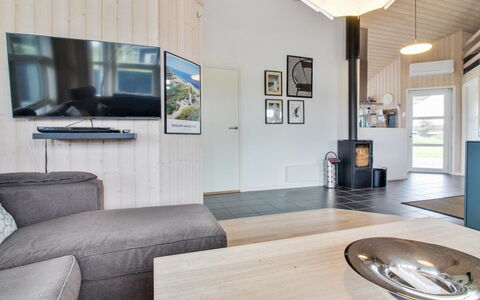 Anett - 400M from the Sea: Interior Design, Flooring, Wood, Floor, Ceiling, Furniture, Living Room, Light Fixture, Room, Couch