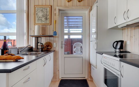 Karlsson - 500M from the Sea: Kitchen, Kitchen Appliance, Flooring, Major Appliance, Wood, Countertop, Interior Design, Floor, Cabinetry, Home Appliance