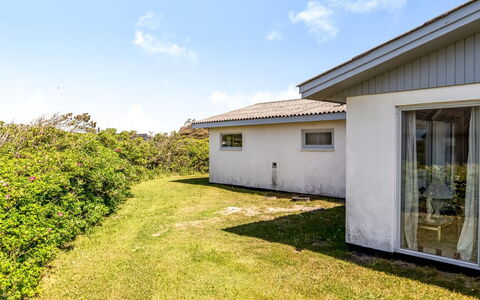 Majvor - 100M from the Sea: Roof, House, Home, Cottage, Siding, Estate, Driveway, Garden Buildings, Yard, Shed