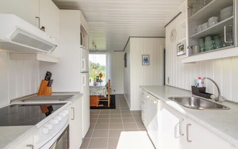 Demus - 900M from the Sea: Flooring, Kitchen, Interior Design, Floor, Ceiling, Countertop, Cabinetry, Kitchen Appliance, Hardwood, Wood Flooring