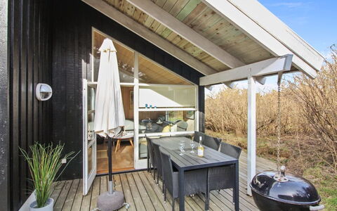 Ømod - 300M from the Sea: Wood, Porch, Home, Door, Cottage, Roof, Deck, Hardwood, Chair, Garden Buildings