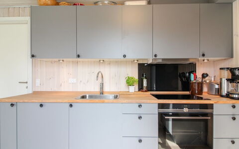 Marino - 480M from the Sea: Kitchen, Kitchen Appliance, Countertop, Flooring, Cabinetry, Wood, Interior Design, Furniture, Kitchen Sink, Major Appliance