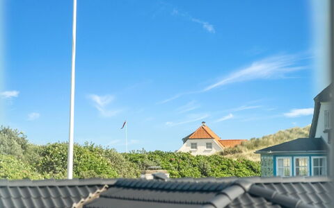 Bruse - 125M from the Sea: Sky, Blue, Daytime, Roof, Pole, Sunlight, Slope, Daylighting, Shade