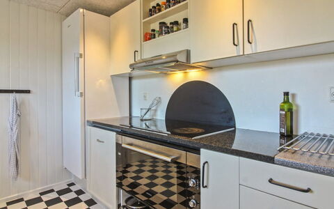 Janakij - 475M from the Sea: Flooring, Kitchen, Kitchen Appliance, Interior Design, Countertop, Floor, Major Appliance, Home Appliance, Lighting, Kitchen Stove
