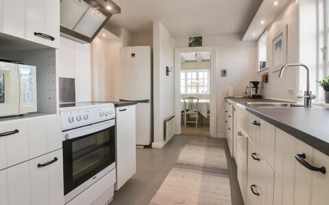Fania - 200M from the Sea: Flooring, Wood, Ceiling, Floor, Kitchen, Interior Design, Cabinetry, Countertop, Furniture, Home