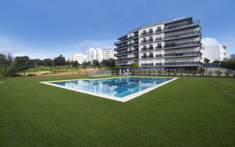 Emerson Plaza: Sky, Building, Water, Plant, Swimming Pool, Tower Block, Condominium, Tree, Urban Design, Residential Area