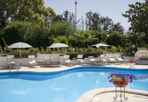 Villa Sole Martina Franca: Swimming Pool, Outdoor Furniture, Furniture, Umbrella, Resort, Sunlounger, Chair, Eco Hotel, Leisure, Shade