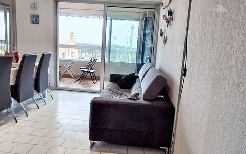 Terre Marine: Furniture, Floor, Flooring, Apartment, Interior Design, Room, Living Room, Couch, Chair, Ceiling