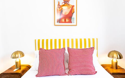 Perla del Mar: Yellow, Bedroom, Orange, Bedding, Bed, Bed Sheet, Throw Pillow, Linens, Pillow, Bed Frame