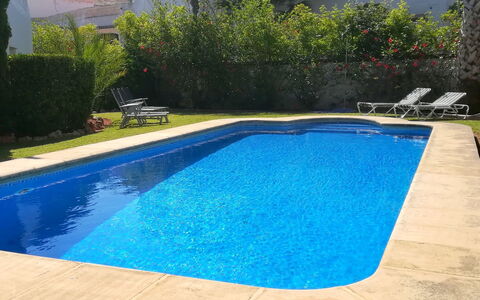 Toscamar: Building, Property, Sky, Light, Azure, Swimming Pool, Plant, Window, Shade, Tree