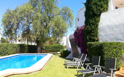 Toscamar: Building, Property, Sky, Light, Azure, Swimming Pool, Plant, Window, Shade, Tree