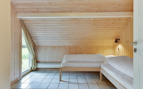 Ellanor - 1Km from the Sea: Wood, Flooring, Interior Design, Ceiling, Floor, Furniture, Attic, Bedroom, Bed, Room
