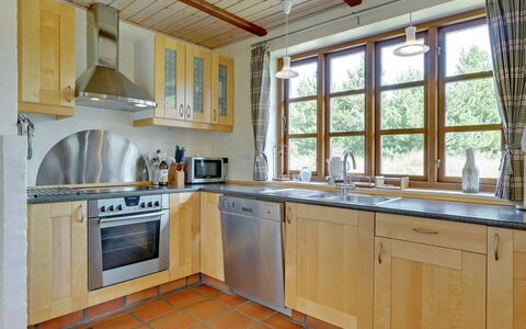 Siegried - 2.2Km from the Sea: Kitchen, Furniture, Countertop, Cabinetry, Wood, Interior Design, Kitchen Appliance, Flooring, Major Appliance, Room