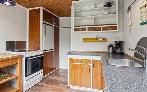 Christian - 3.5Km from the Sea: Kitchen, Countertop, Major Appliance, Kitchen Appliance, Interior Design, Cabinetry, Flooring, Wood, Furniture, Ceiling