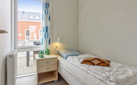 Rebus - 2.3Km from the Sea: Flooring, Floor, Wall, Interior Design, Furniture, Wood, Ceiling, Room, Bedroom, Bed