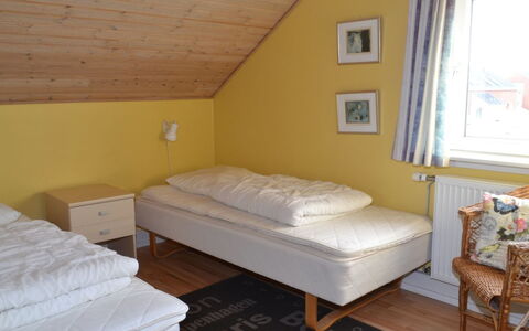 Nilaus - 2.3Km from the Sea: Bed, Furniture, Bedroom, Floor, Interior Design, Flooring, Wood, Bed Sheet, Bedding, Yellow