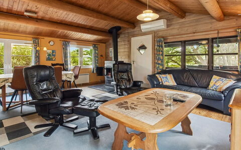 Thorbergh - 2Km from the Sea: Furniture, Wood, Couch, Interior Design, Living Room, Ceiling, Home, Flooring, Chair, Floor