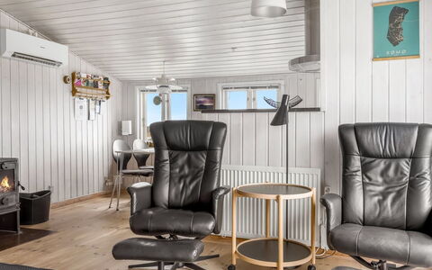 Mortensen - 350M from the Sea: Furniture, Interior Design, Flooring, Floor, Living Room, Home, Wood Flooring, Chair, Room, Cabinetry