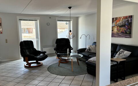 Bosse - 2.3Km from the Sea: Furniture, Flooring, Floor, Interior Design, Wall, Wood, Living Room, Lighting, Couch, Room