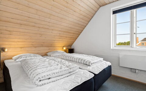 Langsom - 100M from the Sea: Wood, Bedroom, Hardwood, Daylighting, Bed, Bedding, Wood Stain, Bed Frame, Attic, Plank