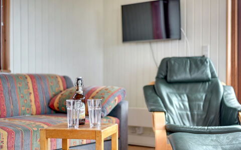 Sybilla - 700M from the Sea: Furniture, Flooring, Interior Design, Floor, Wood, Room, Ceiling, Table, Living Room, Lighting