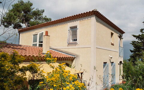 La Cigale: Flower, Sky, Plant, Cloud, Building, Property, Window, Tree, House, Yellow
