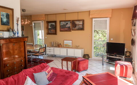 La Cigale: Picture Frame, Furniture, Property, Plant, Cabinetry, Table, Building, Television, Living Room, Interior Design