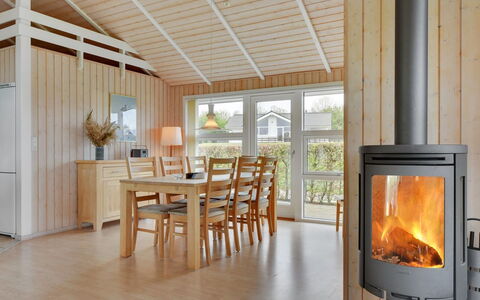 Deline - 250M from the Sea: Wood, Flooring, Floor, Ceiling, Interior Design, Room, Wood Stain, Light Fixture, Hardwood, Living Room