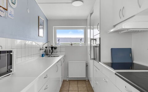 Kita - 500M from the Sea: Kitchen, Major Appliance, Countertop, Kitchen Appliance, Flooring, Interior Design, Floor, Cabinetry, Ceiling, Sink