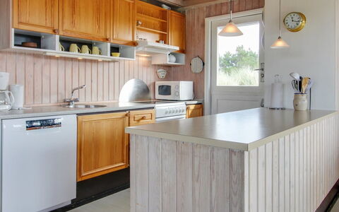 Elsa - 700M from the Sea: Kitchen, Countertop, Furniture, Wood, Flooring, Interior Design, Kitchen Appliance, Cabinetry, Floor, Lighting