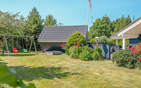 Maureen - 10.5Km from the Sea: Roof, House, Garden, Cottage, Lawn, Shade, Yard, Garden Buildings, Landscaping, Backyard