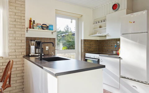 Laurin - 600M from the Sea: Kitchen, Countertop, Kitchen Appliance, Interior Design, Flooring, Cabinetry, Major Appliance, Wood, Furniture, Floor