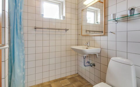 Laurin - 600M from the Sea: Bathroom, Plumbing Fixture, Bathroom Sink, Flooring, Floor, Sink, Toilet, Toilet Seat, Interior Design, Plumbing