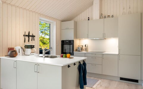 Nanouk - 500M from the Sea: Kitchen, Countertop, Kitchen Appliance, Flooring, Wood, Interior Design, Furniture, Cabinetry, Major Appliance, Floor
